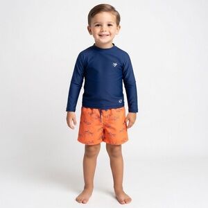 Toddler Boys pair of Cat & Jack orange swim trunks featuring blue shark print